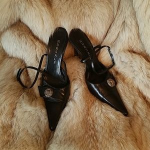 Black leather heels with ankle straps